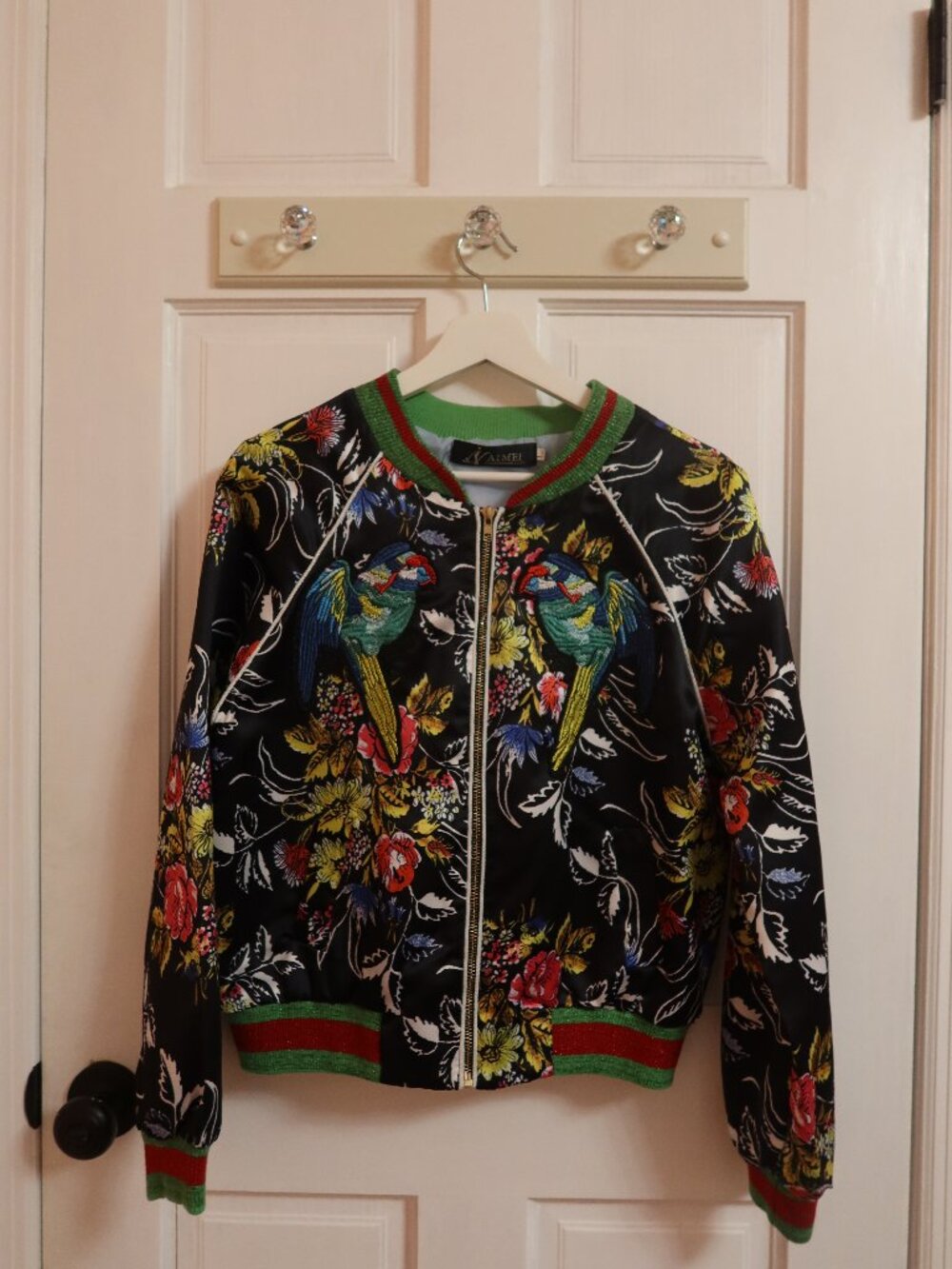 Large colorful patch bomber jacket